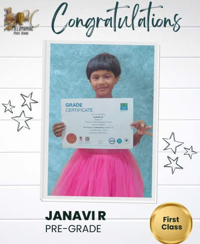 Student holding a Carnatic music grade certificate
