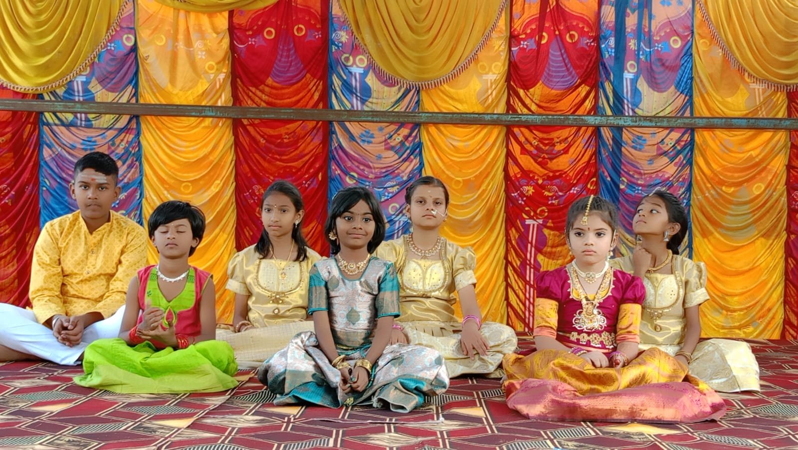 Students seated together at a decorated devotional event