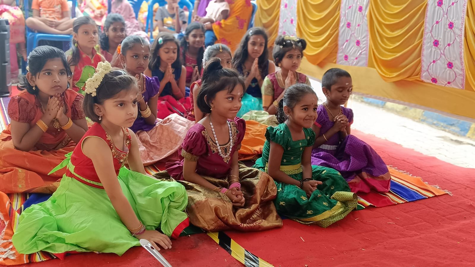 Students seated together during a devotional gathering